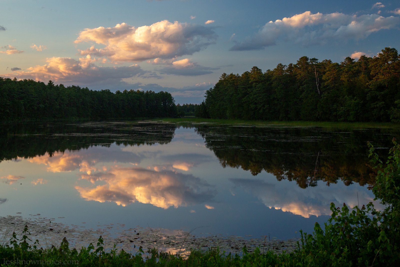 Harrisville Pond on a partly cloudy evening